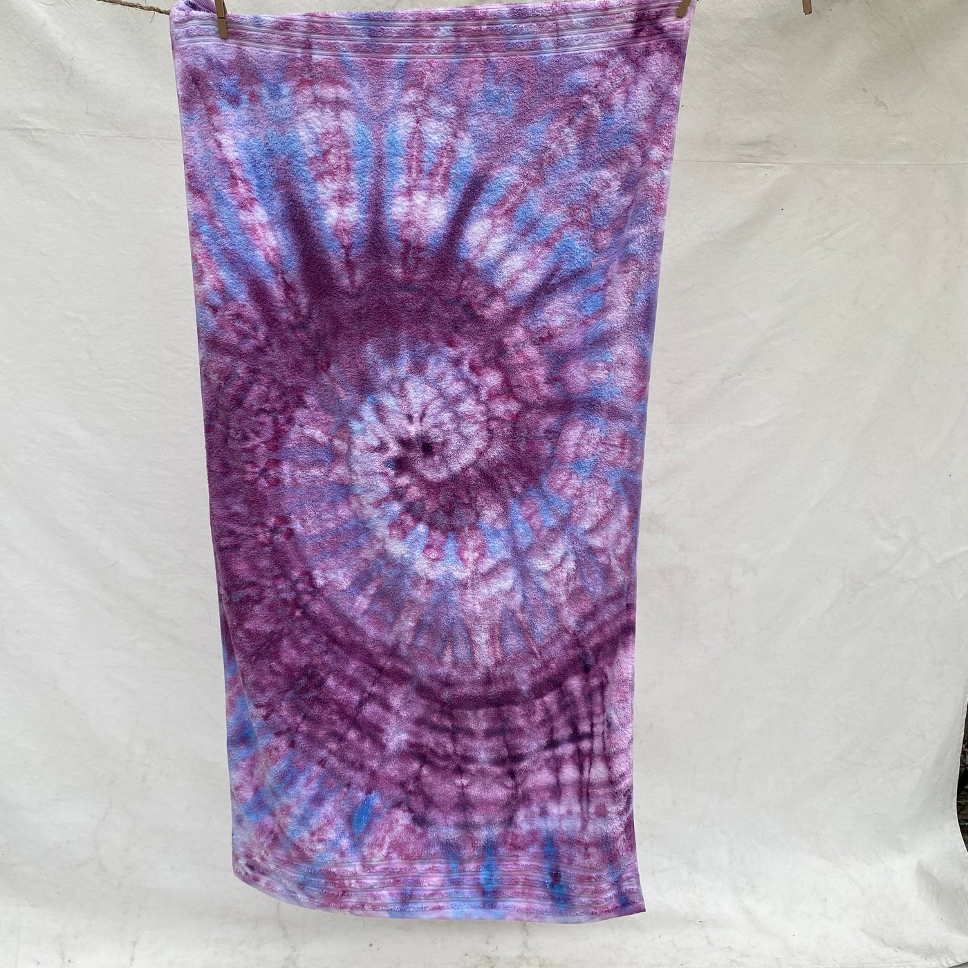 light purple spiral Beach Towel